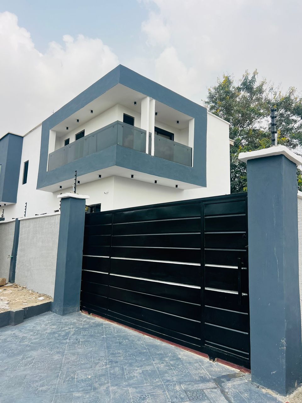 Completed residential building with gate